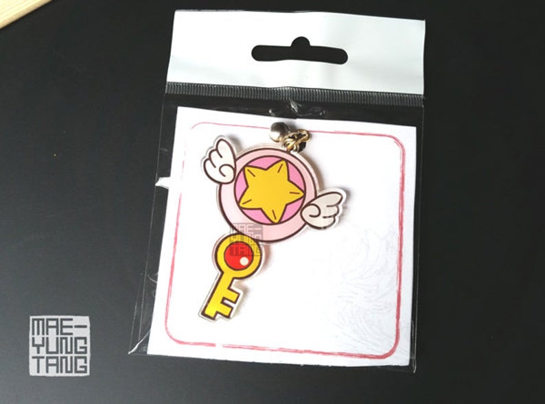 Keychain- Digimon Digicrest 2 in. Clear Acrylic Charm picture