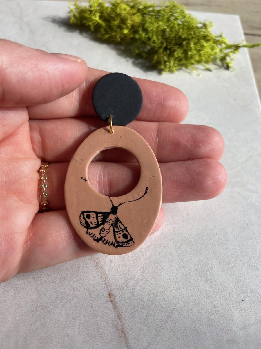 Hand Painted Moths on Dark Tan Oval Dangles with Large Black Studs picture