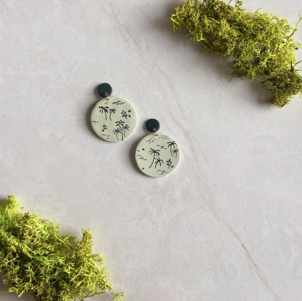 Hand Painted Beach Inspired Design on Sage Green Large Circle Dangles with Small Black Studs picture