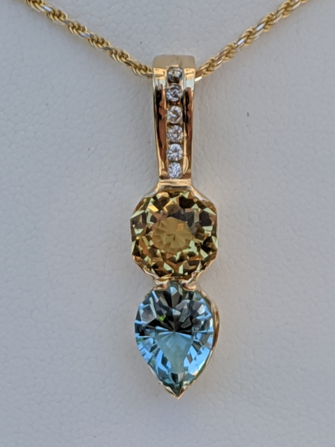 Aquamarine/Beryl/ diamond 14 kt gold pendant