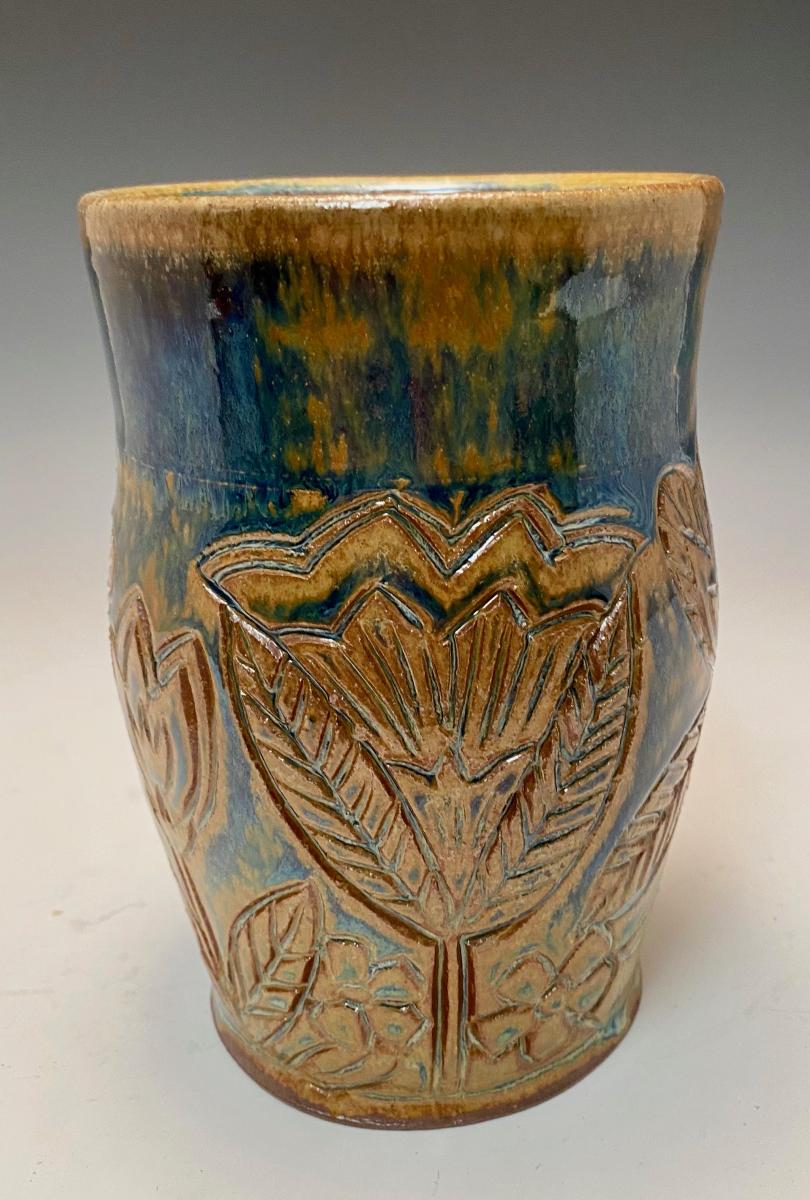 whimsical flower utensil holder/vase picture