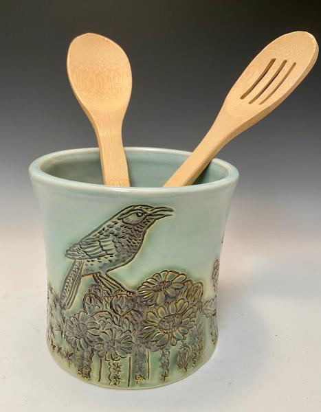 utensil/wine holder with birds and cacti picture