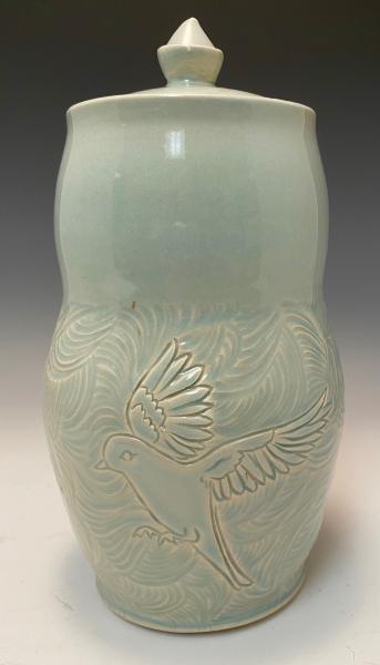carved bird jar