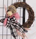 Natural wood vine wreath with wooden flowers