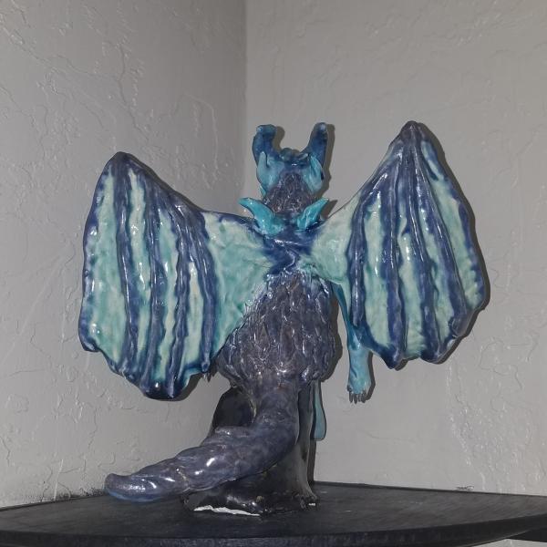 Ceramic Fantasy Dragon Woman Sitting on Rock Sculpture picture