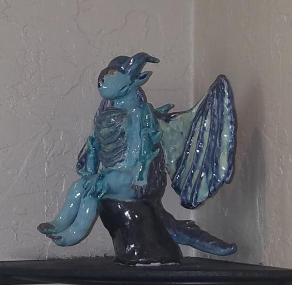 Ceramic Fantasy Dragon Woman Sitting on Rock Sculpture picture