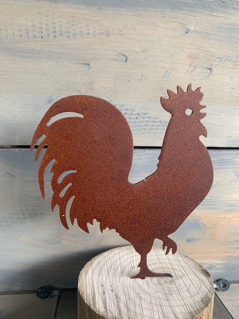 metal chicken art on stand