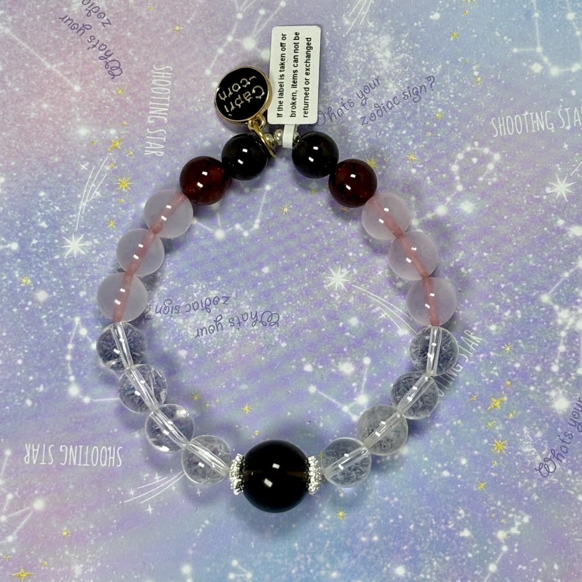 Capricorn Zodiac Bracelet – Rose Quartz, Clear Quartz, Garnet,& Smoky Quartz picture