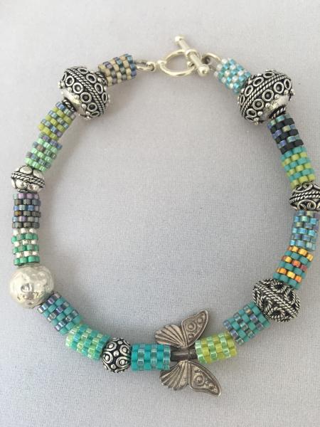 Beaded bead and sterling silver bracelet