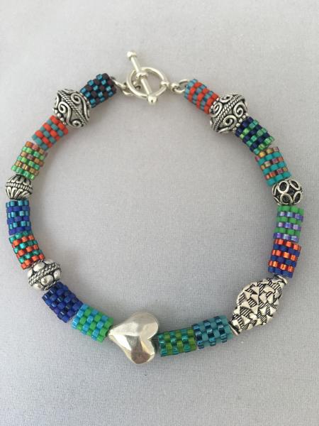 Beaded bead and sterling silver bracelet