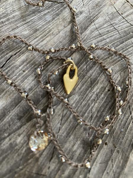 Tiny gold heart charm necklace picture