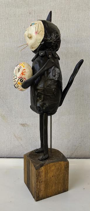 Cat with skull picture