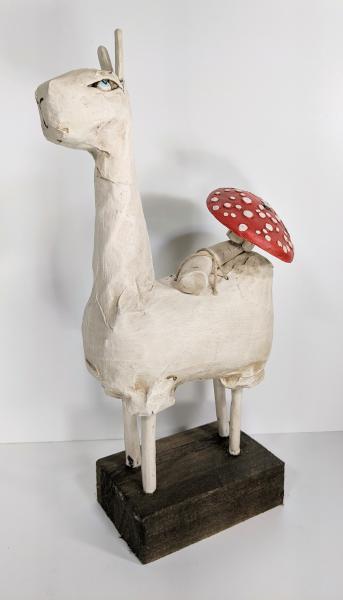 Llama with red mushroom