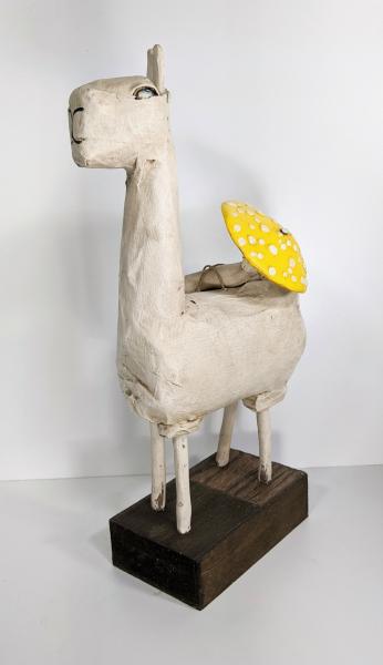 Llama with yellow mushroom picture