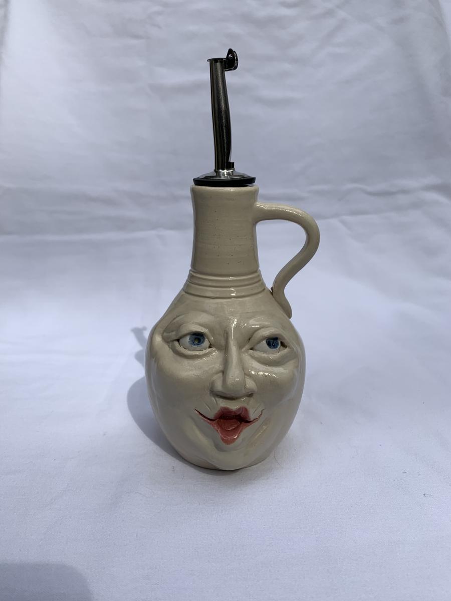 Face olive oil dispenser picture
