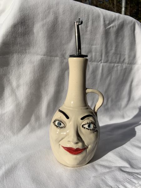 face olive oil dispenser