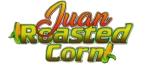 Juan roasting corn