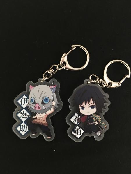 Inosuke and Giyu demon slayer keychain set