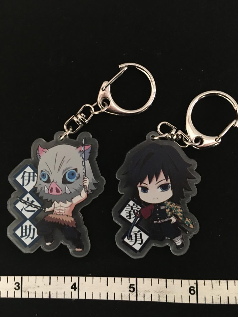 Inosuke and Giyu demon slayer keychain set picture
