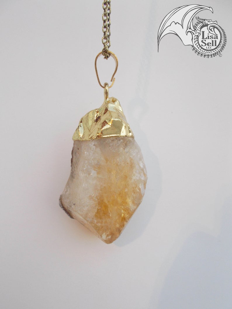 Brown Dragon on White and Yellow Stone Pendant picture