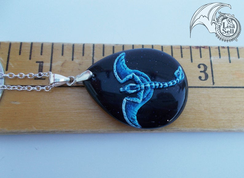 Blue Dragon Pendant on Dark Gold Stone picture