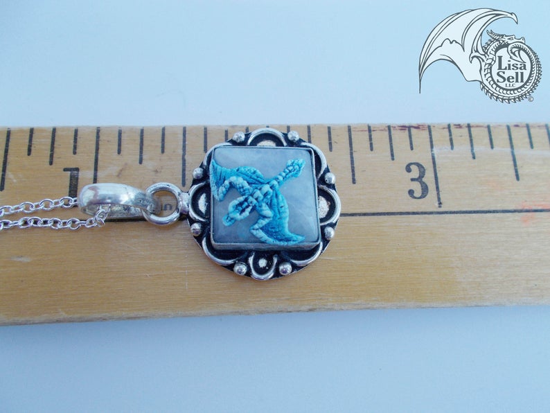 Light Blue Dragon on Moonstone Pendant picture