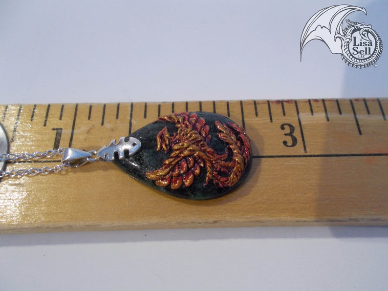 Phoenix on a Different Greens colored Stone Pendant picture