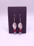 Sterling silver leaf earrings with red lava stone