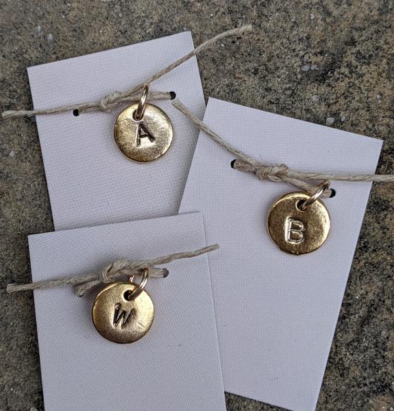 Tiny Hand Stamped Gold Initial Charm picture