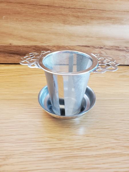 Mesh in cup tea infuser picture