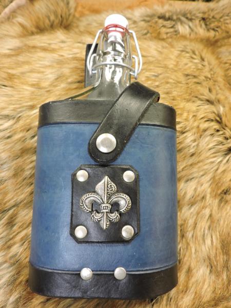 Leather wrapped flasks and tankards picture