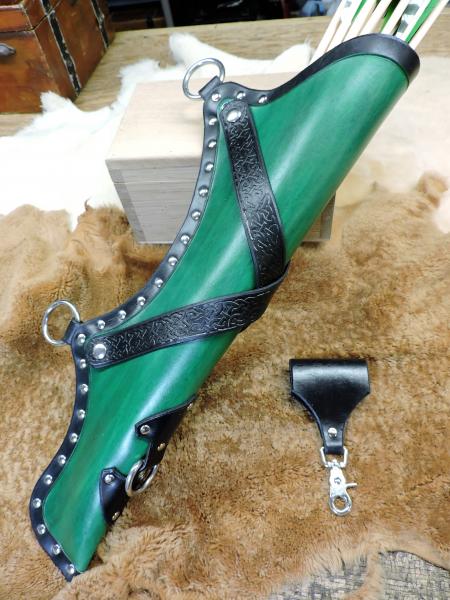 leather quivers and arm guards picture