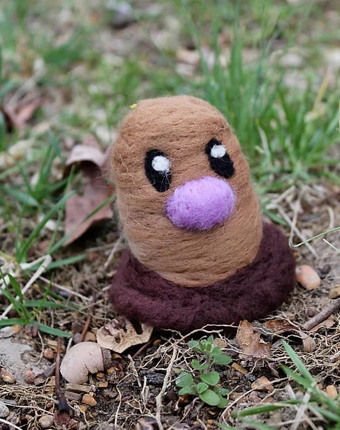 Felted Brown Ground Creature picture