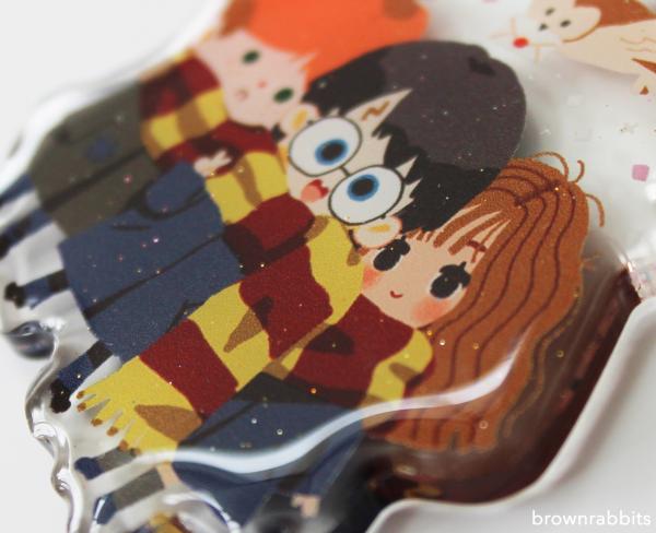 Fantastic Beasts Newt/ Harry Potter Golden Trio Keychain picture