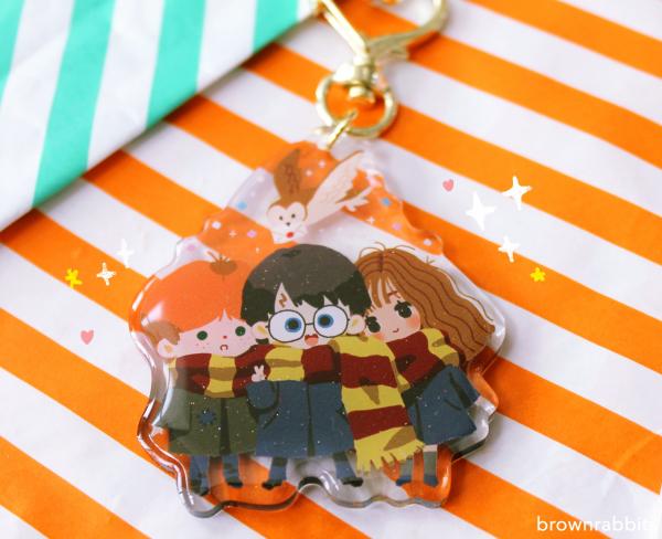 Fantastic Beasts Newt/ Harry Potter Golden Trio Keychain picture